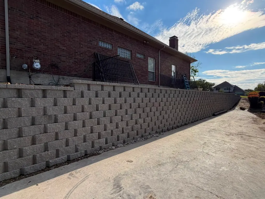 Close view of a concrete block retaining wall installation