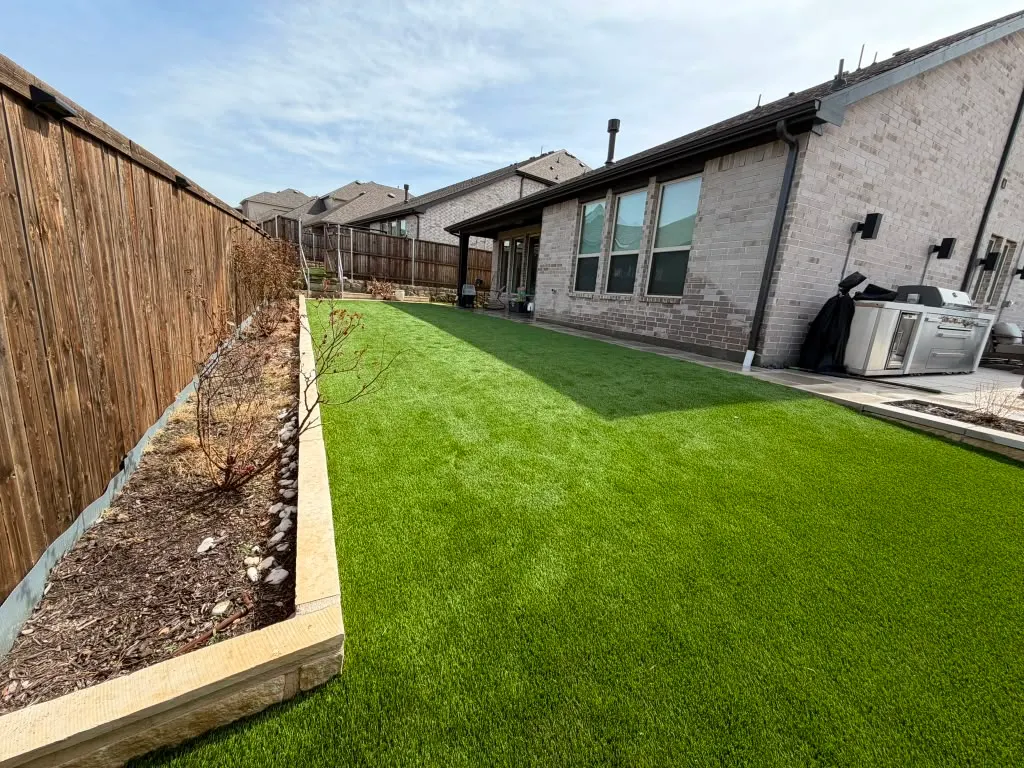 Artificial turf installed along a residential side yard